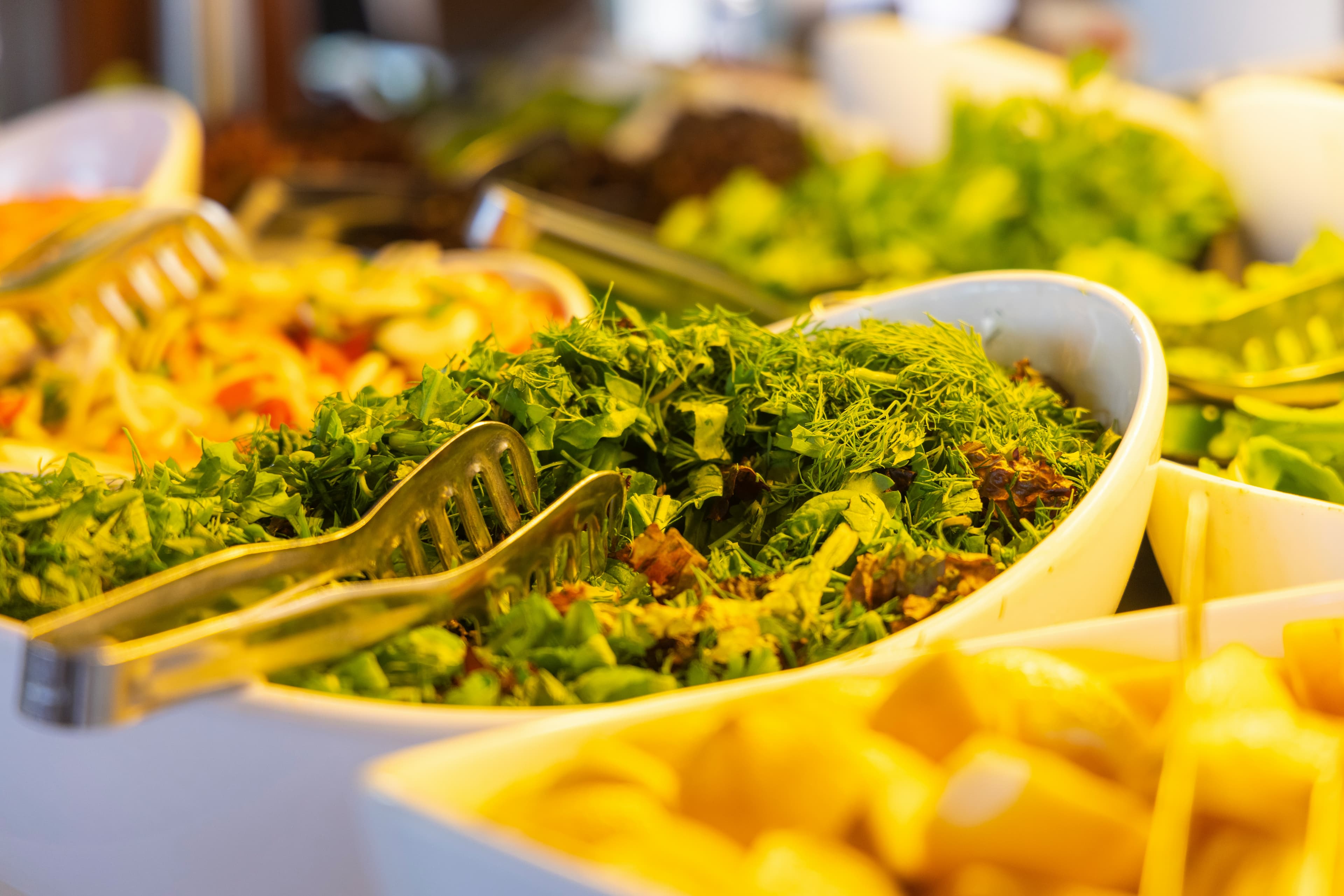 Fresh greens prepared for a catering order